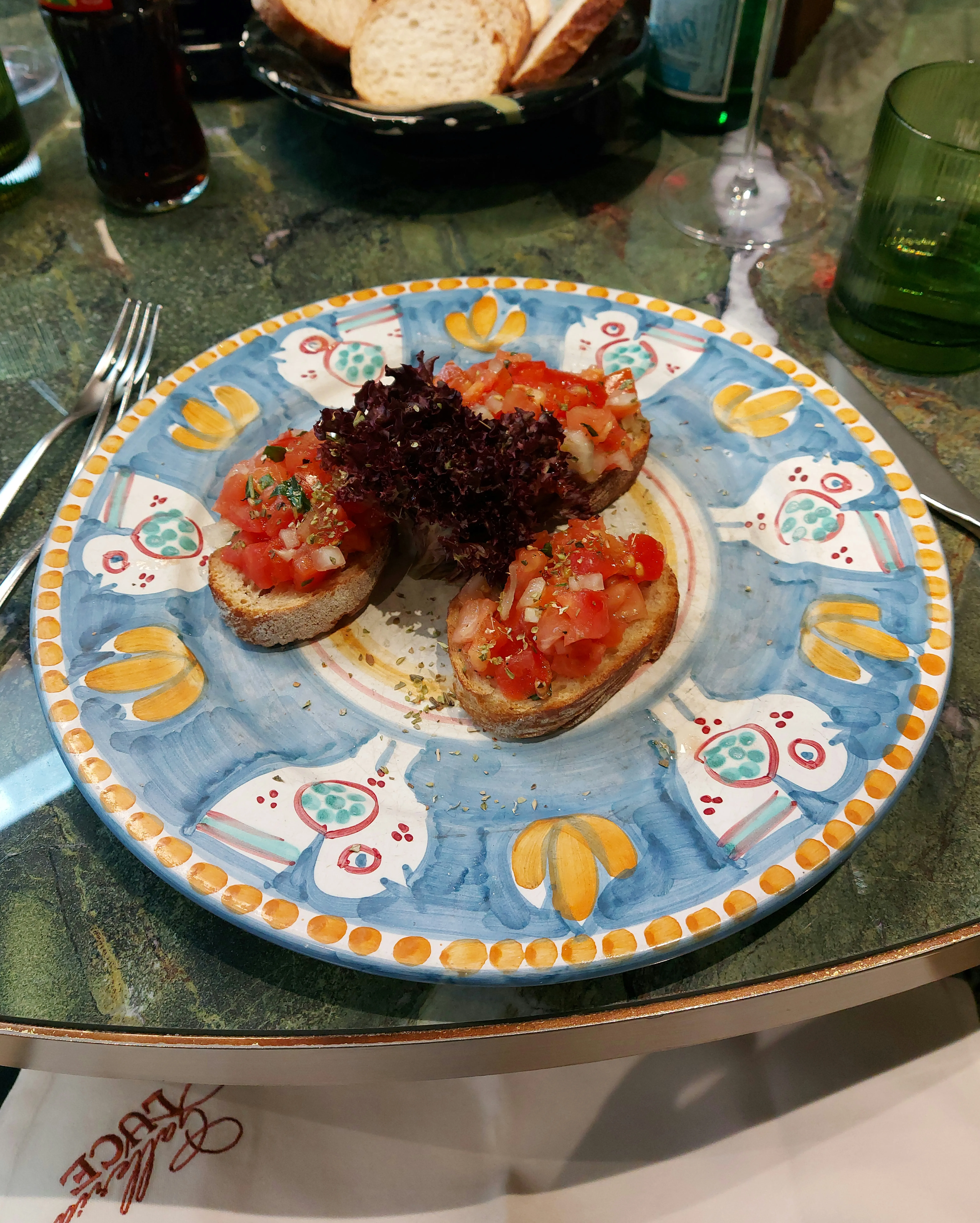 Bruschetta at Galleria Luce Bern with toasted bread, tomatoes, onions, and garlic