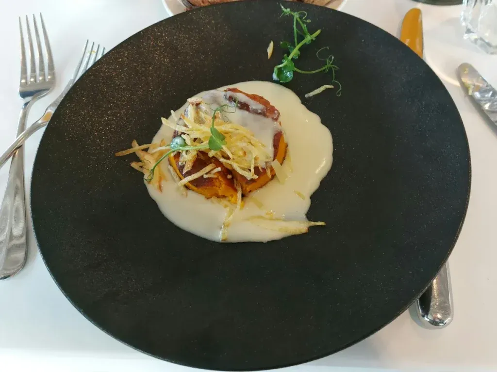 Kürbis-Soufflé mit Ziegenkäse-Fondue im Nido Bern