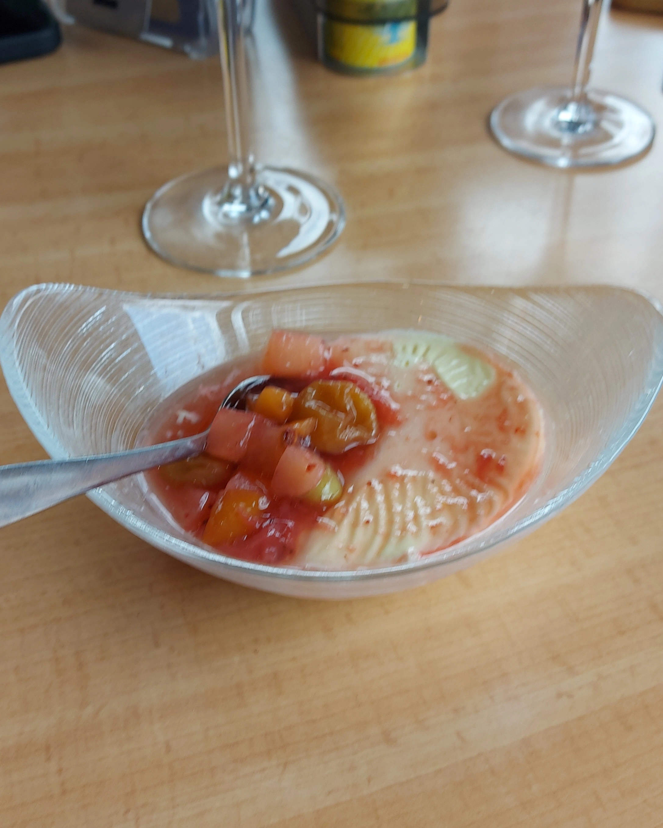 Complimentary panna cotta with fruit salad at Trucker Restaurant Bar Bern