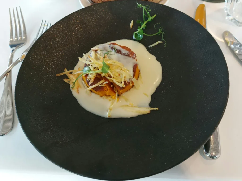 Nido Bern Kürbissoufflé mit Ziegenkäse Fondue